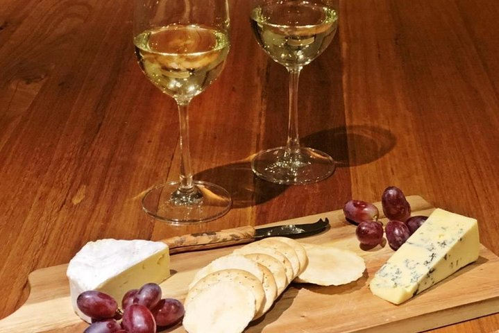 Enjoy a complimentary wine or beer and cheese boards